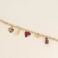 Bracelet - perles en céramique, trèfle et coeur en résine, botte et bouche