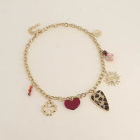 Collier - scarabée, trèfle ajouré, coeurs en résine léopard, rose, soleil et perles