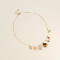 Collier - pendentifs (pierres naturelles, scarabée, soleil, trèfle en résine léopard, trèfle)