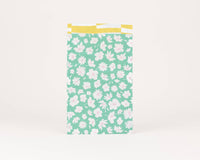 Sacs en papier marguerites, vert: Taille M (12 x 21 cm)