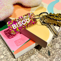 Porte-clés à paillettes Fuchsia / Or : BISOU