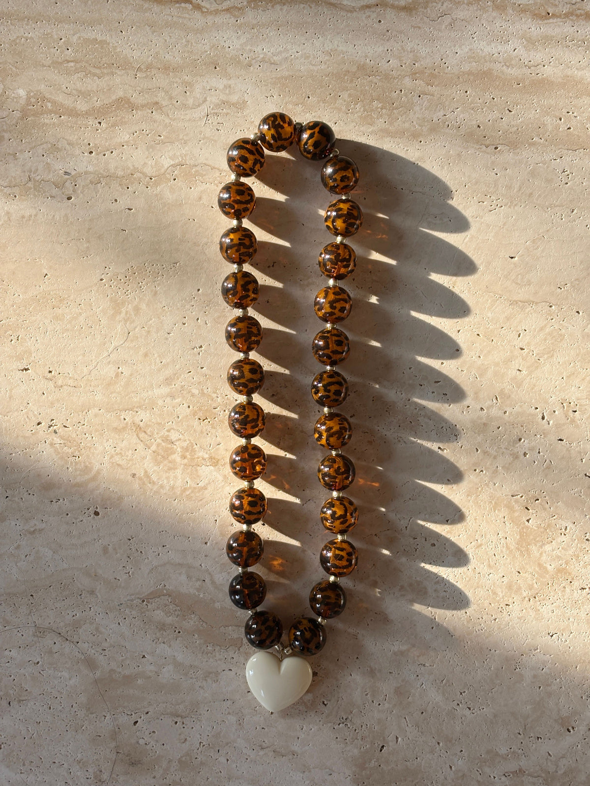 Collier Alma léopard