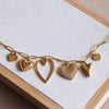 Collier à breloques « Coeurs »
