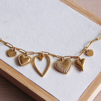 Collier à breloques « Coeurs »