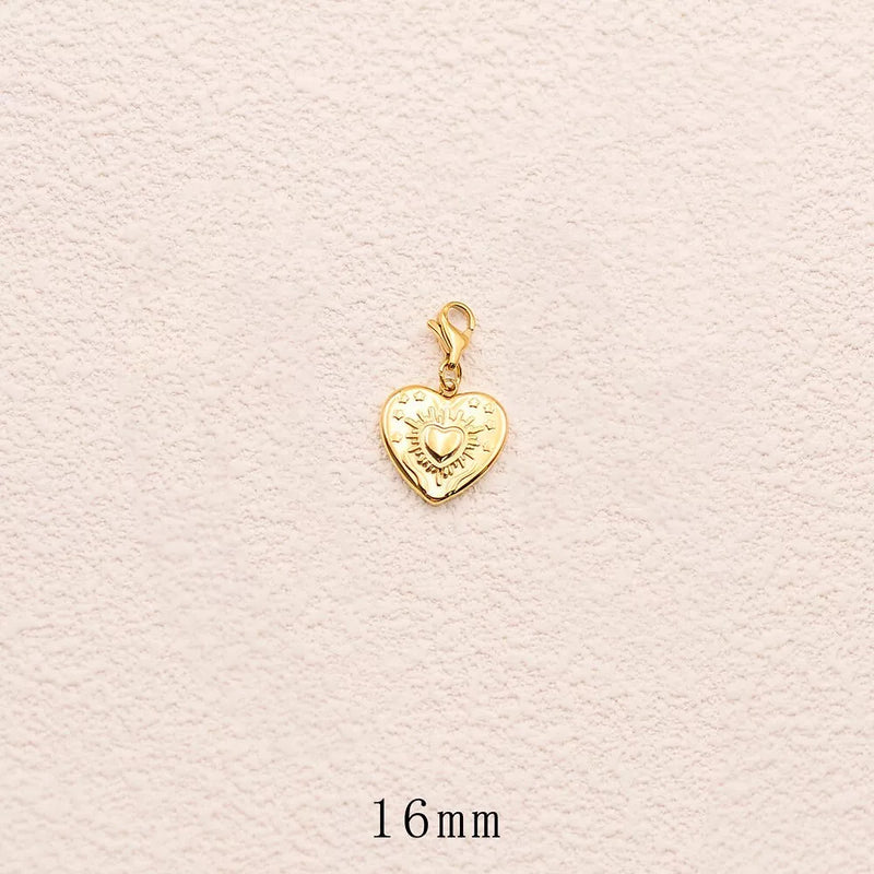Charm - coeur, étoiles et soleil