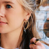 Boucle d'oreille en acier inoxydable avec cœur ouvert XL — doré