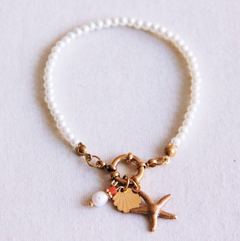 Bracelet de perles avec étoile de mer, coquillage et perle
